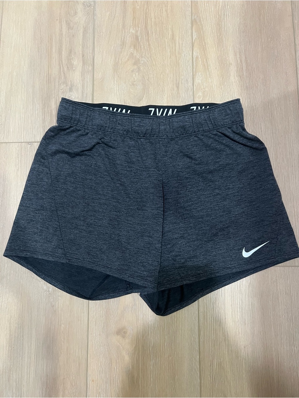 Nike Women’s Dark Black/Gray Heather Athletic Shorts with White Swoosh